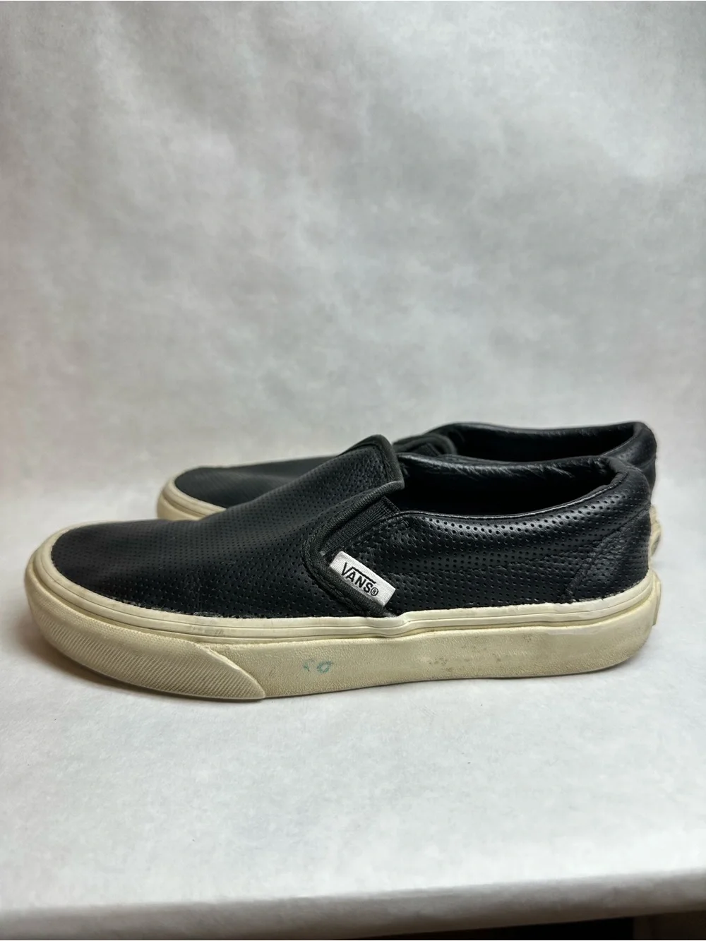 Vans Black Perforated Leather Slip-On Sneakers